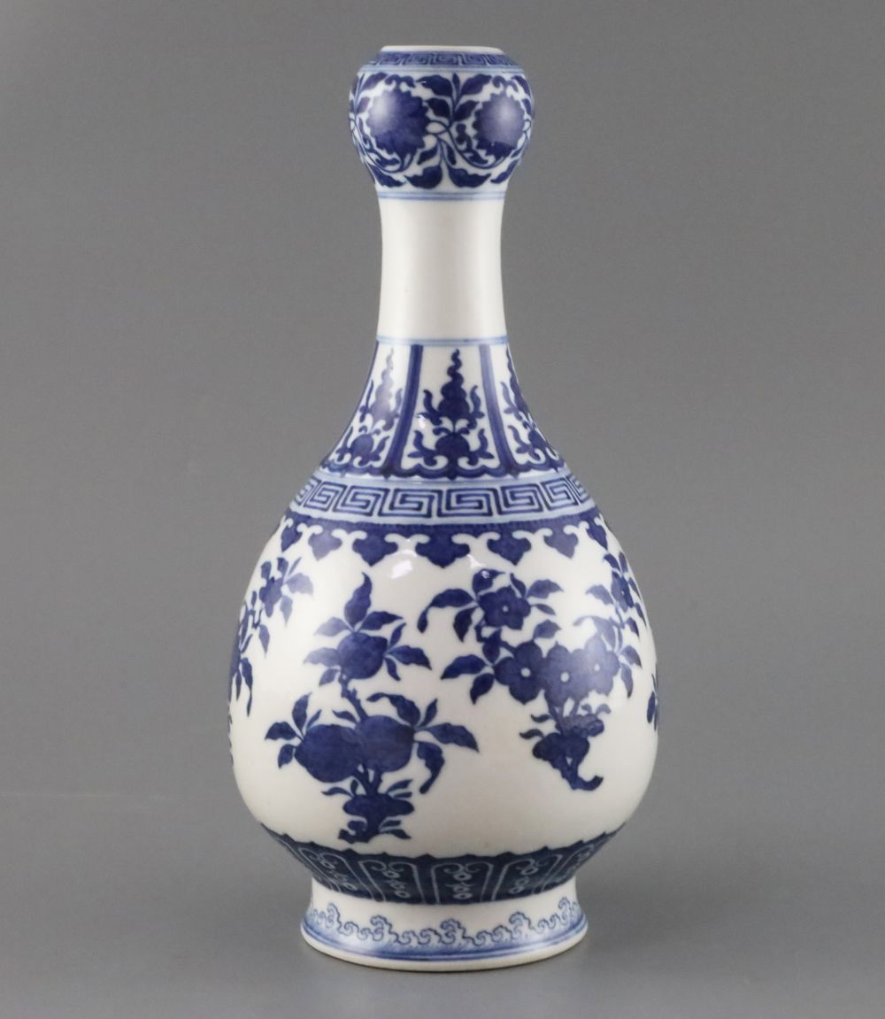 A Chinese blue and white garlic neck vase, Qianlong seal mark but later, drilled hole through mark, height 29.5cm